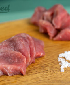 Detailansicht Schweinefilet in Scheiben geschnitten